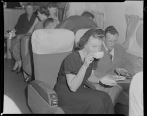 Pan American World Airways courtesy flight, showing passengers drinking hot and cold beverages