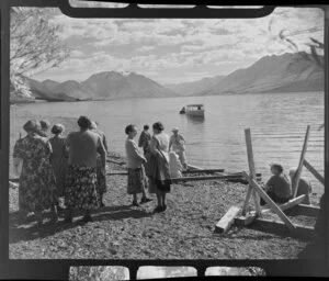 Lake Ohau, Waitaki District, Canterbury Region, showing guests from the Ohau Lodge awaiting to board a charter boat