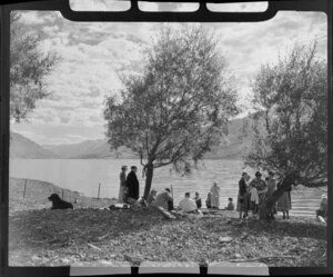 Lake Ohau, Waitaki District, Canterbury Region, showing guests from the Ohau Lodge down by the shore