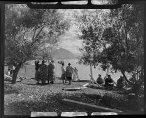 Lake Ohau, Waitaki District, Canterbury Region, showing guests from the Ohau Lodge awaiting to board charter boat