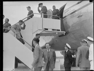 Pan American World Airways courtesy flight, showing passengers disembarking aircraft