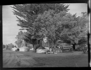 Camping grounds, Taupo, showing people near tents