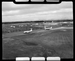 Harewood Airport, Christchurch, 1953 London-Christchurch Air Race, showing two aircrafts BEA Viscount (front) and KLM DC6 (rear) and large crowd of spectators