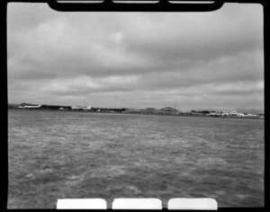 Harewood Airport, Christchurch, during the 1953 London-Christchurch Air Race, showing planes in the distance