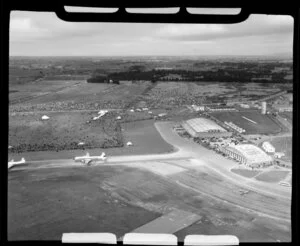 1953 London-Christchurch Air Race, Harewood, Christchurch, showing KLM DC6 aircraft on tarmac