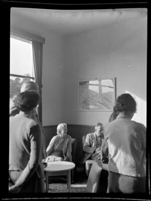 Lady Norrie, Mick Sullivan and others indoors, Fox Glacier, West Coast Region