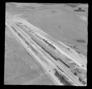 Rail yard with open wagons and boxcars, farmland, Kawerau, Bay of Plenty