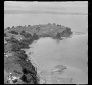Manly, Whangaparaoa Peninsula, Auckland, showing houses and cliff face