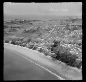 Stanmore Bay, Whangaparaoa Peninsula, Auckland Region, showing houses and beach