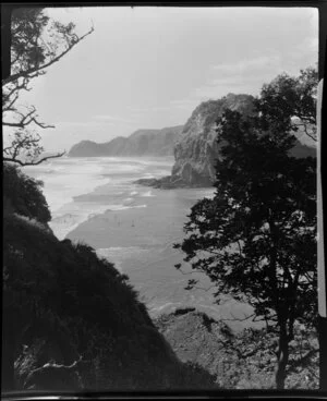 Beach at Piha, Auckland, showing part of Lion Rock