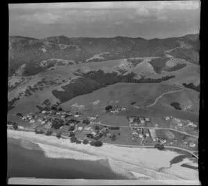 Langs Beach, Northland, showing houses and hills