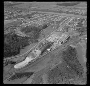 Wanganui, closeup view over Kempthorne Prosser Chemical Works, with Brunswick Road to Aramoho residential area and Wanganui River beyond