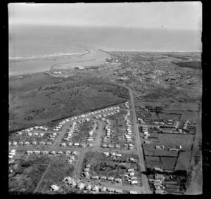 Wanganui, Gonville, showing Heads Road with residential housing and the Wanganui River with river mouth