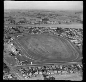 Wanganui, Gonville, showing racecourse and Spriggens Park and Jacksons Street with residential housing, with the Whanganui River and farmland beyond