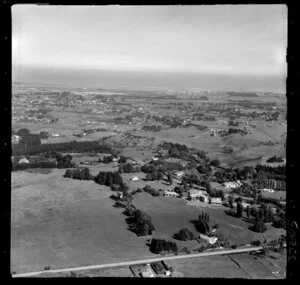 Wanganui, showing Virginia Road and school with trees, farmland and residential housing to the coast beyond