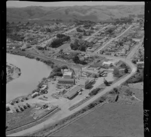 Helensville, Auckland, showing Mill Road and Commercial Road (part of State Highway 16), dairy factory and Kaipara River