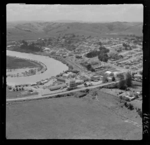 Helensville, Auckland, showing Mill Road and Commercial Road (part of State Highway 16), dairy factory and Kaipara River