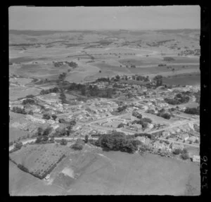 Helensville, Auckland, showing view over town and the Kaipara River running through dairy country beyond