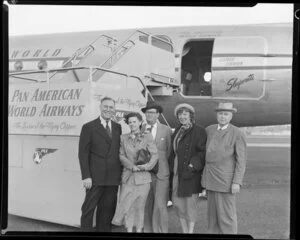 Pan American World Airways, passengers, Mr Harvey Hancock (left), [Mrs?] Sue Hancock, Mr Pascal Cowan (centre), [Mrs?] Frances Kroll and Mr Frederick Kroll, [Auckland?]