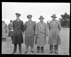 At aerial topdressing trials, from left, Wing Commander Pitt, RAF; Lieutenant Colonel W B Taylor, USAA; R M Scotton, United States Ambassador to New Zealand and Squadron Leader R Gibbs, RNZAF, Masterton