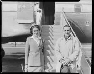 Hostess and passenger after British Commonwealth Pacific Airlines flight