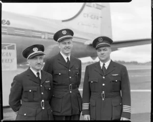 Canadian Pacific Airlines plane 'Empress of Vancouver' at Whenuapai with Captain A Van Lee, navigation officer F O P Wicker and Captain L C Stevenson