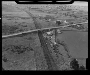 Unidentified factory at Panmure, with railway line and overhead bridge