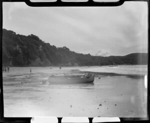 Boat on the beach at Orere Point, Auckland