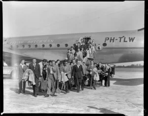 Annual Whenuapai KLM DC-4/C-54A aircraft, Dutch male immigrant passengers disembarking