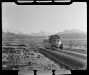 Mount Cook & Southern Lakes Tourist Company Ltd bus, with Mount Cook in background