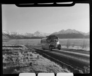 Mount Cook & Southern Lakes Tourist Company Ltd bus with Mount Cook in background