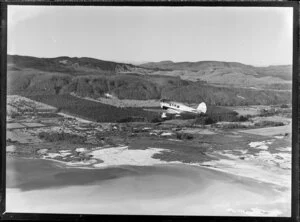Blackmore Air Services Proctor aircraft flying over Rotorua District