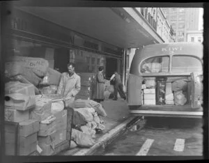 Freight on the footpath at New Zealand National Airways Corporation Auckland office