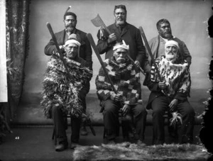 Portrait of six unidentified Maori men, with weapons - Photograph taken by William Henry Thomas Partington