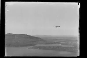 A WACO aircraft operated by Blackmores, over Lake Tarawera, Rotorua Lakes