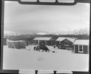 Happy Valley chalet with a car parked in front, skiing on Coronet Peak, Otago