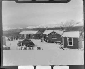 Happy Valley Chalet with a car in front, skiing on Coronet Peak, Otago