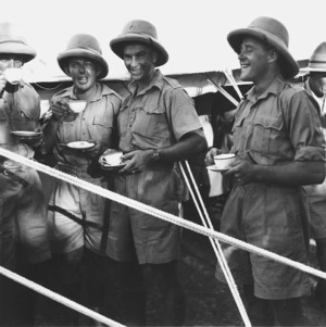World War II soldiers with cups of tea