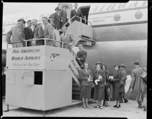 Pan American World Airways, Boeing 377 stratocruiser, Clipper Rainbow, embarking passengers, Whenuapai, Auckland