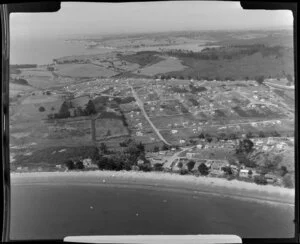 Stanmore Bay, Whangaparaoa Peninsula, showing housing and beach