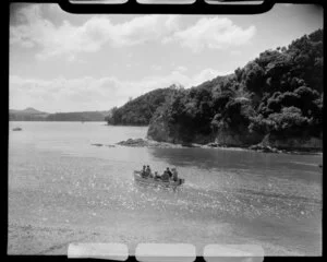 Paihia, Bay of Islands, Northland, showing a group in a dinghy