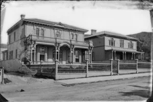 Two large two-storied wooden houses, location identified, probably Wellington