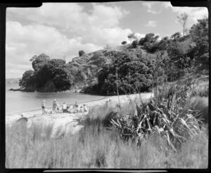 Mita's Island, Bay of Islands, Northland, including unidentified group sitting on beach