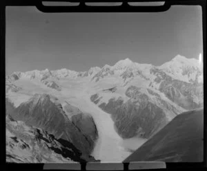 Mount Cook and Southern Lakes aircraft, Auster ZK-BOX in flight over Franz Josef region, Southland