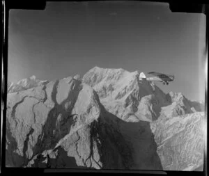 Mount Cook and Southern Lakes aircraft, Auster ZK-BOX in flight over Mount Cook region, Southland