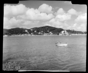 People in rowboat, Paihia, Bay of Islands, Northland