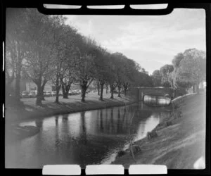 Rolleston Avenue, Christchurch, featuring a stone bridge over the Avon River