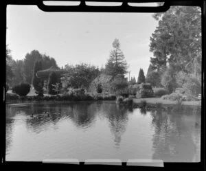 Ashburton Botanic Gardens, Tinwald Domain, featuring Ashburton River, a wooden bridge with a Bandsmens Rotunda