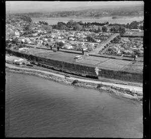 Tauranga, Western Bay of Plenty, showing housing and road along beach