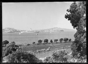 Steamship 'Orsova' in Auckland Harbour, Judges Bay (foreground), Devonport and Rangitoto Island in the distance